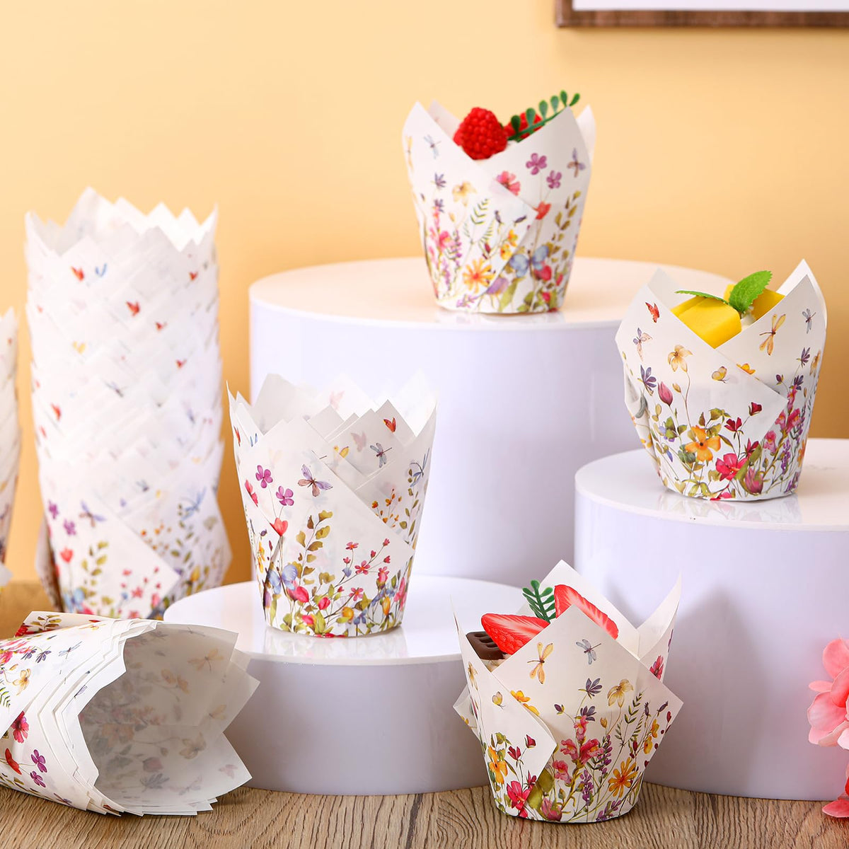 Vesici liners featuring butterflies and dragonflies to brighten treats at celebrations.