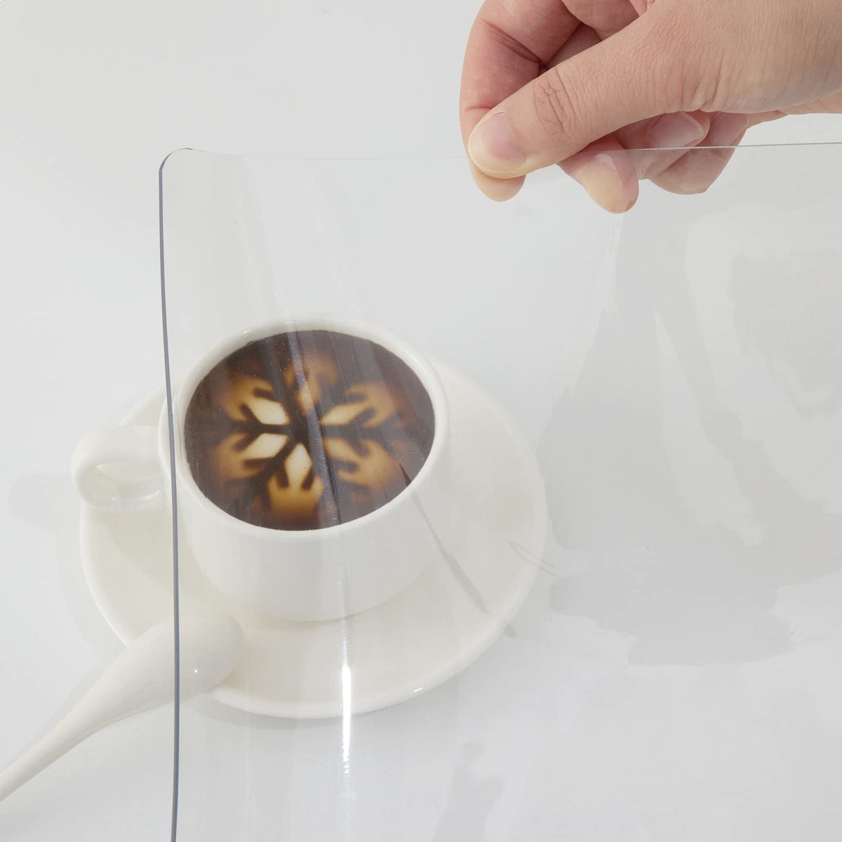 VEVOR PVC table protector demonstrates heat resistance while remaining transparent