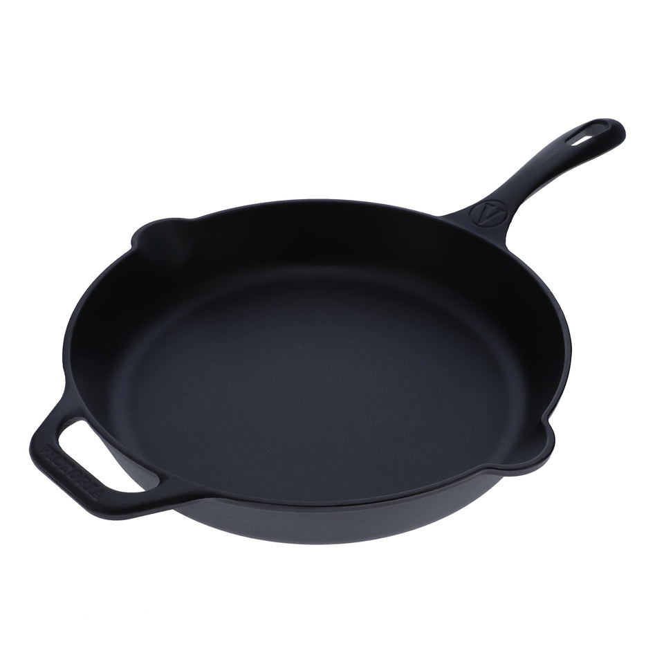 Victoria 12-inch cast iron skillet with long handle for easy grip and even heating.