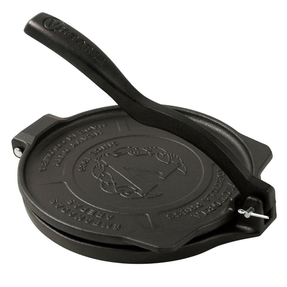 Victoria 8-Inch cast-iron tortilla press with smooth surface for even tortillas.