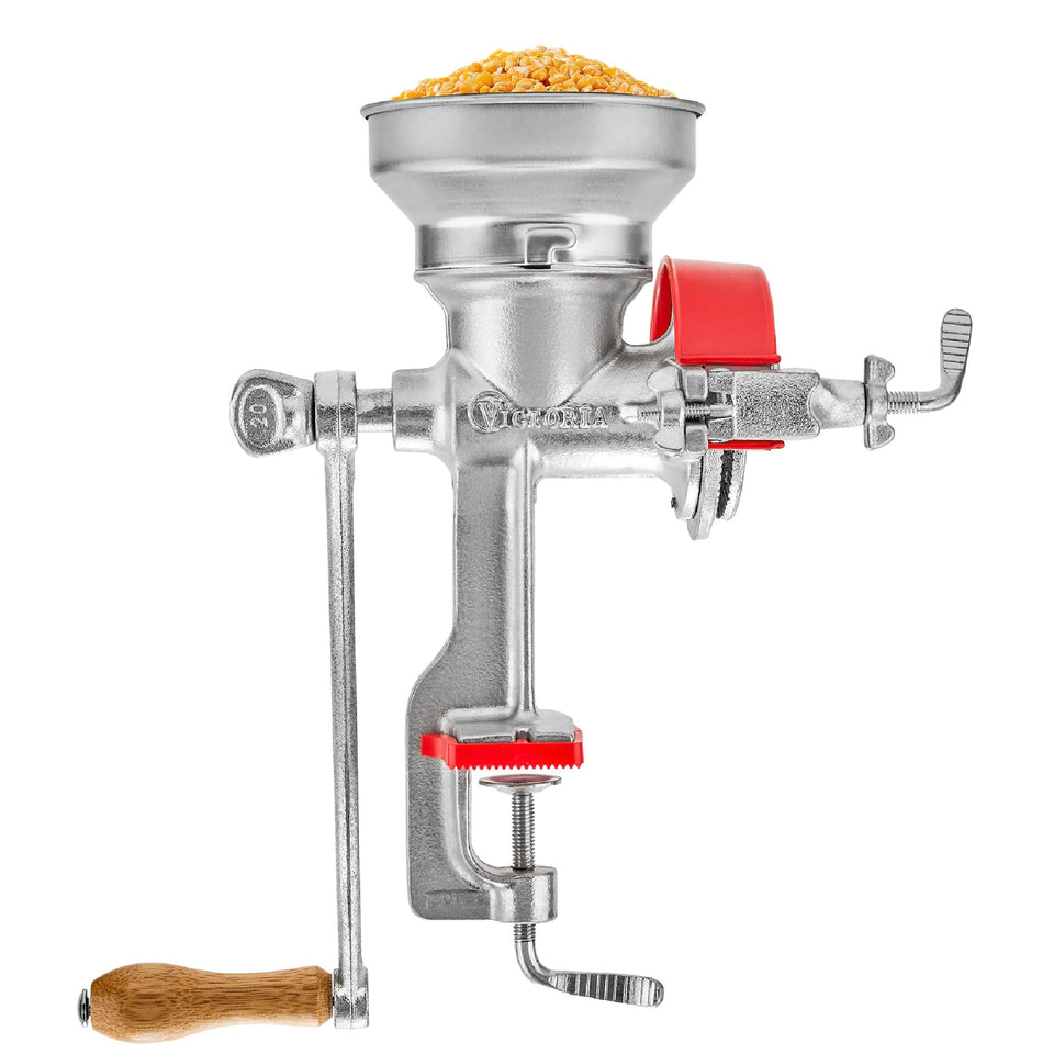 Victoria grain mill with low hopper for compact grinding.