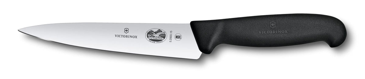 Victorinox Fibrox 6-inch chef knife blade delivering precise vegetable slicing.