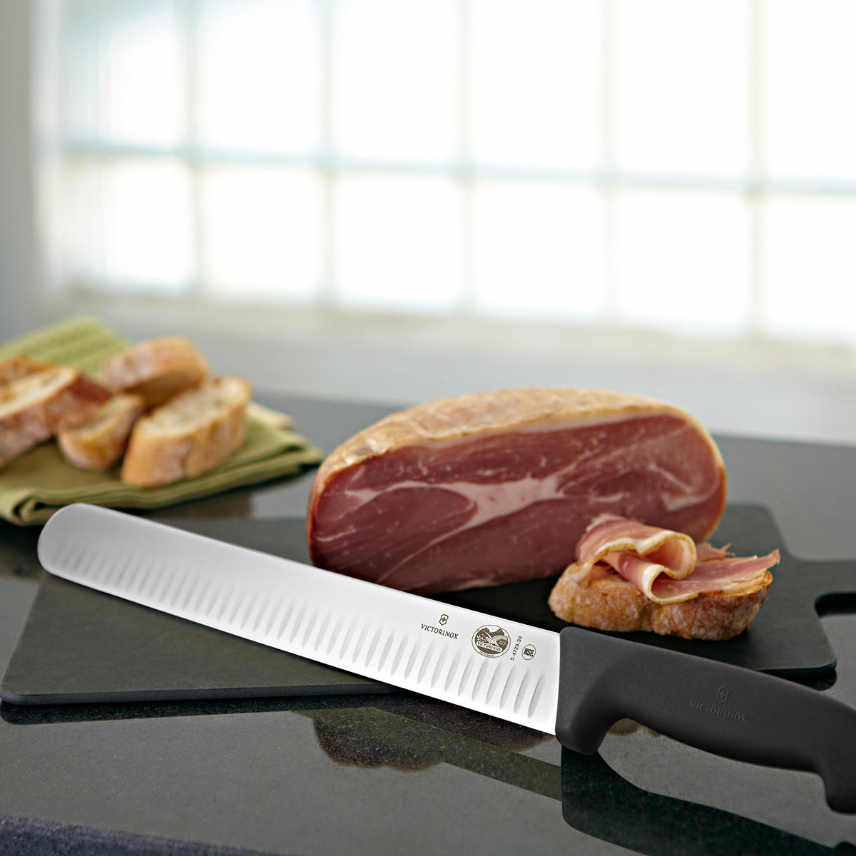 Victorinox Fibrox Pro slicing knife with ergonomic handle offers secure, non-slip grip