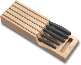 Victorinox Swiss Classic bread knife in a beechwood drawer organizer for precise slicing.