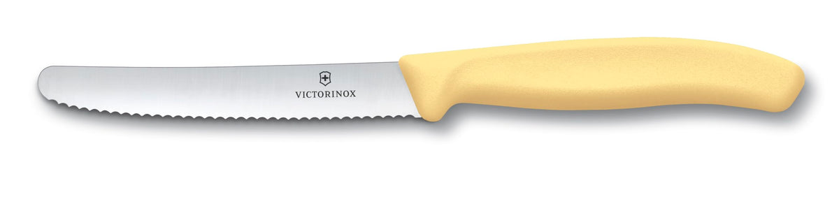 Victorinox Swiss Classic 11 cm blade closeup shows a sharp wavy edge.