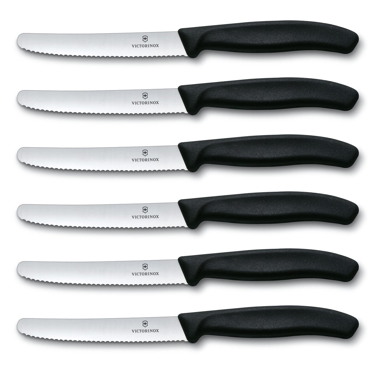 Textured ergonomic handle on a Victorinox Swiss Classic knife for comfortable grip.