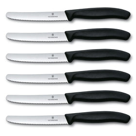 Textured ergonomic handle on a Victorinox Swiss Classic knife for comfortable grip.