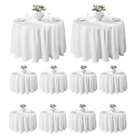 VidaFete white 120-inch round tablecloth on a dining table for an elegant setup.