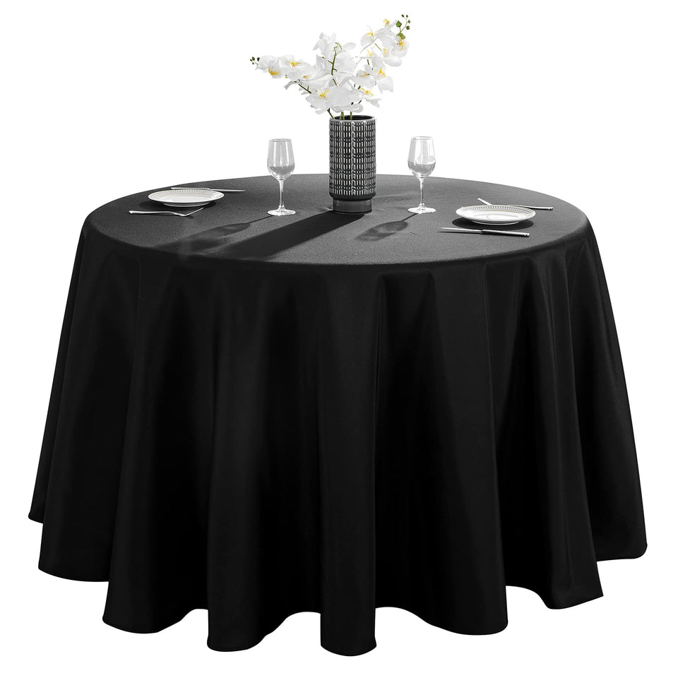 VidaFete 90-inch round tablecloth spread over a table, offering a sleek dining surface