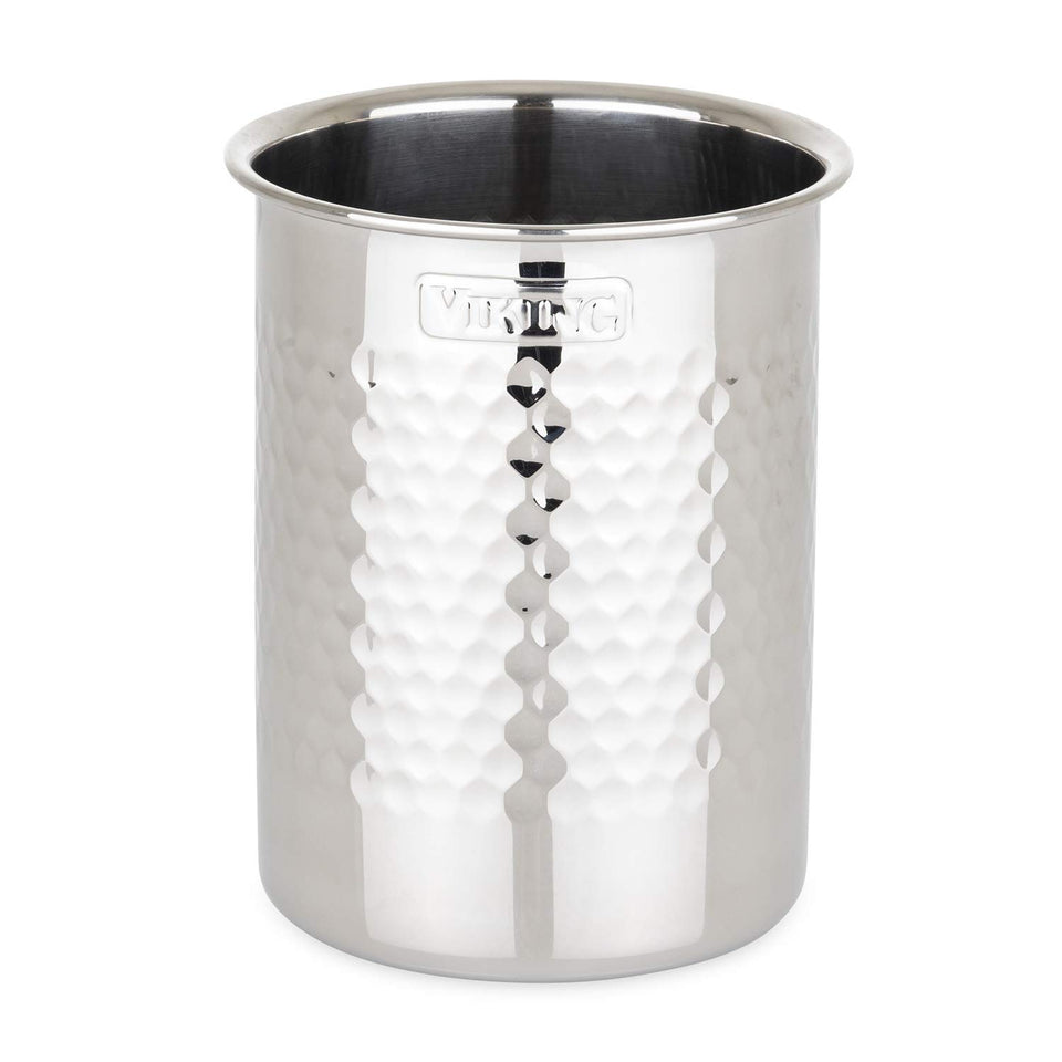 Viking hammered stainless steel utensil crock on a counter for easy access to utensils.