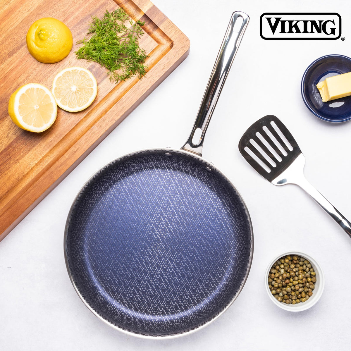 Ergonomic stainless-steel handle on Viking Hybrid Plus with heat break and secure grip.
