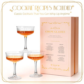 VIMERPA vintage-inspired coupe glasses on a lighted display shelf