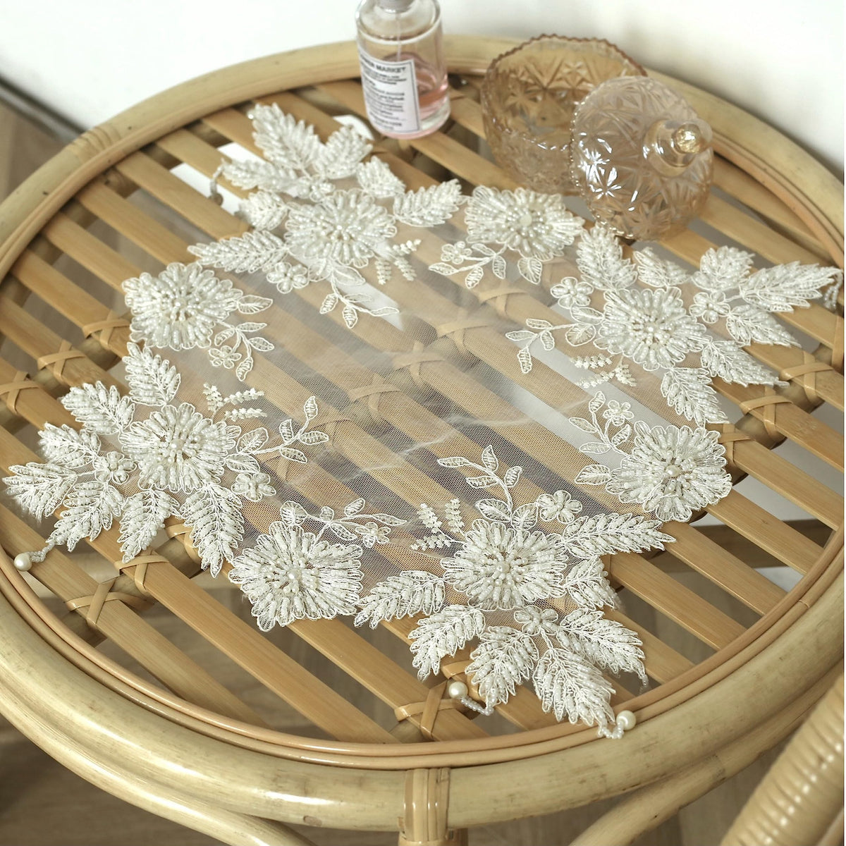 VIRFONOR lace doilies on a coffee table as a vase mat and centerpiece accent