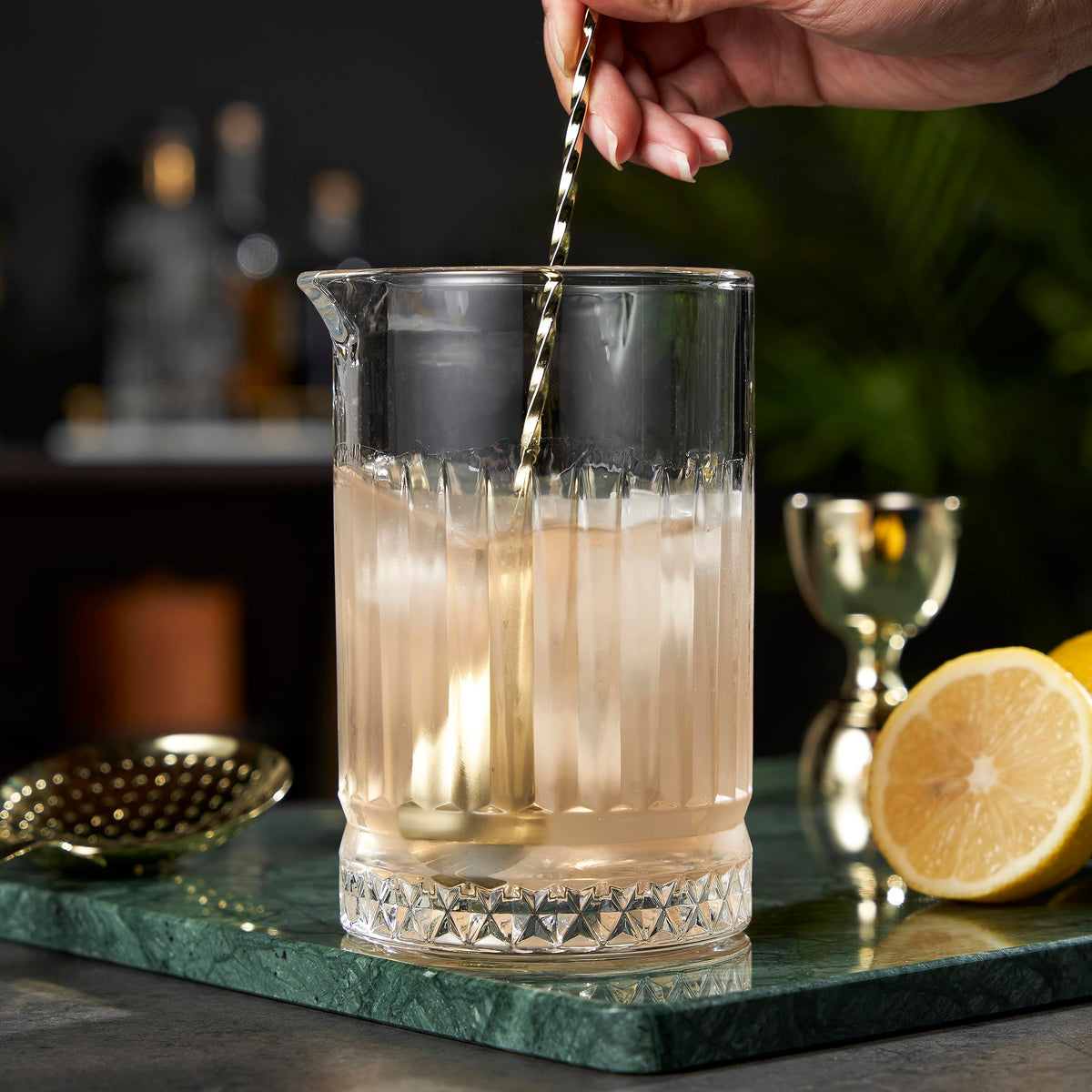 Viski crystal mixing glass' transparent design highlights ingredients and technique during service.