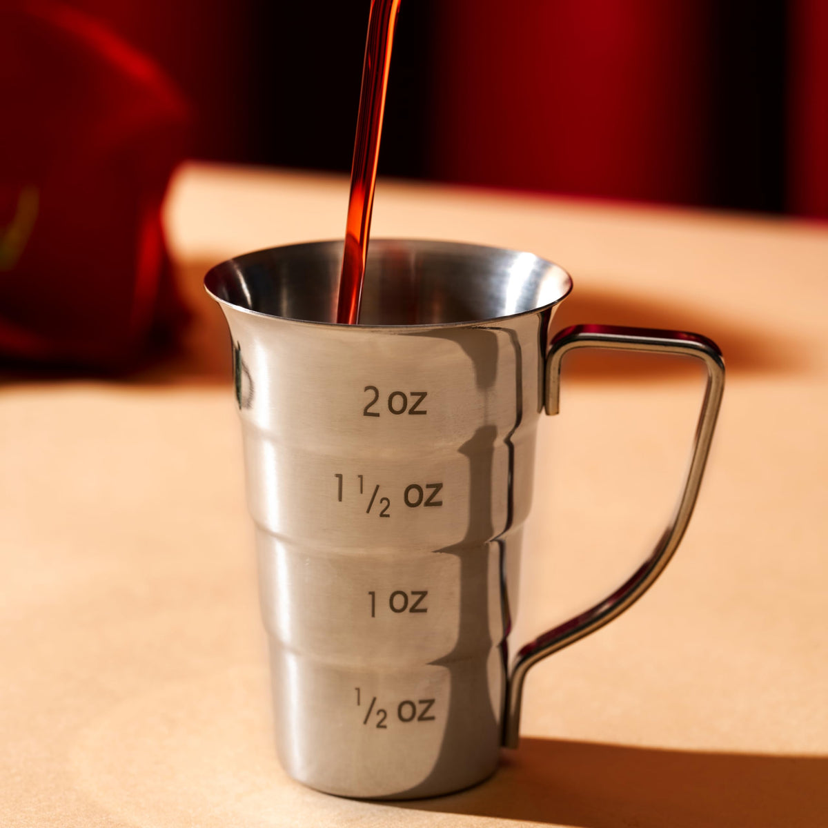 Viski stepped jigger stainless steel finish complements professional barware.