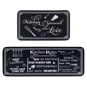 Voanos dual-runner kitchen mats set in black and white for comfortable standing.