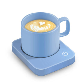 VOBAGA mug warmer on a desk keeps coffee warm during work.