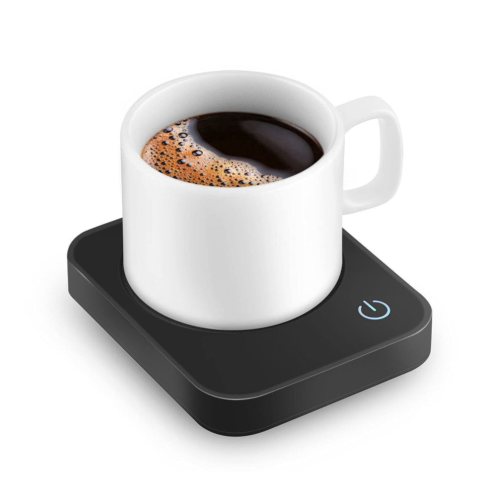 VOBAGA coffee mug warmer on a desk keeps coffee warm during work.