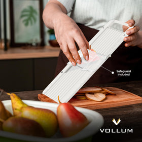 Vollum safety guard protecting fingers during mandoline use