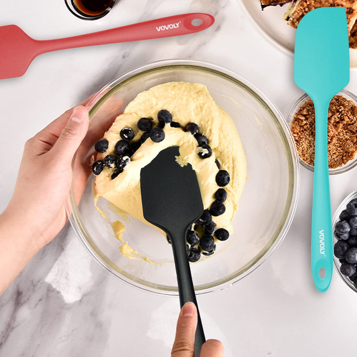 Vovoly spatula in use demonstrates versatile scraping and mixing