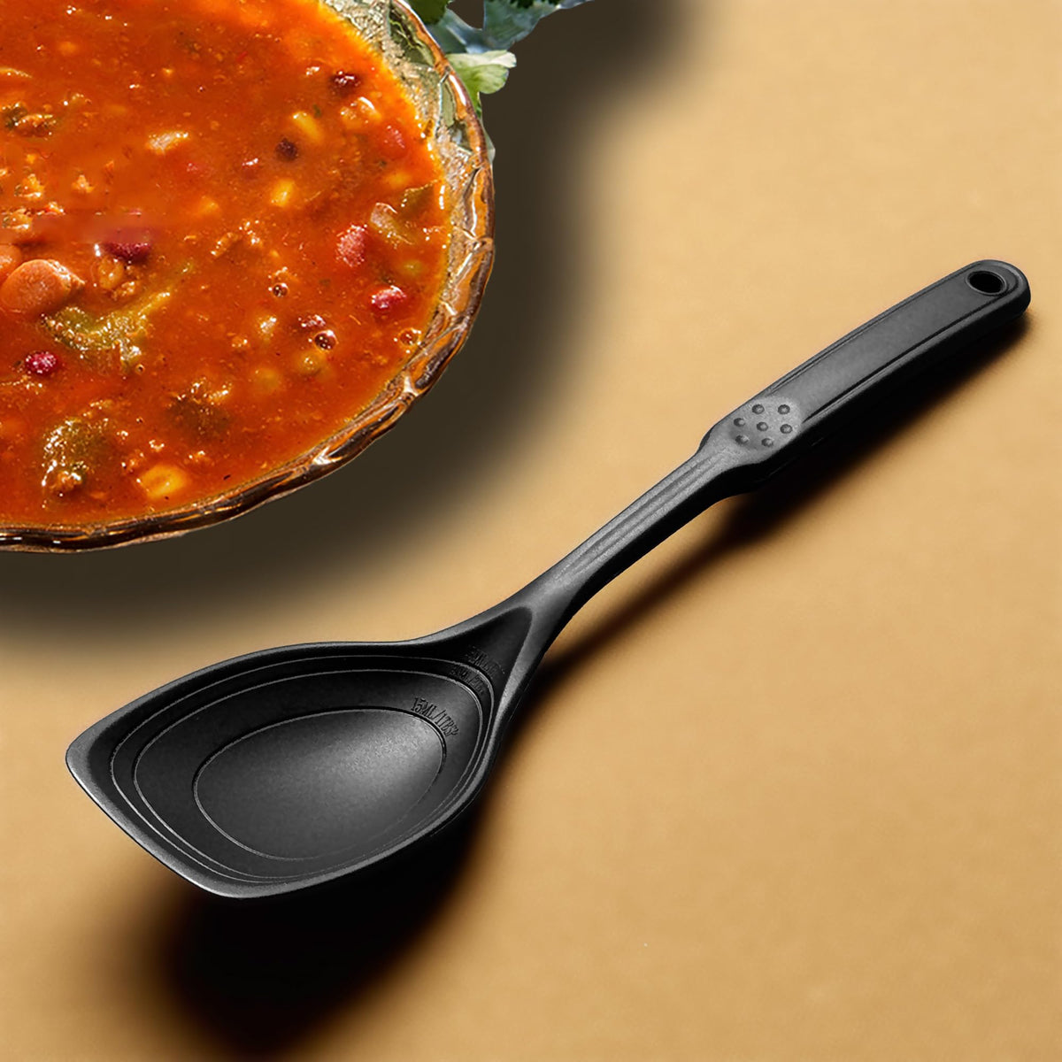 Vovoly black silicone spoon complements a modern kitchen.