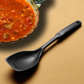 Vovoly black silicone spoon complements a modern kitchen.