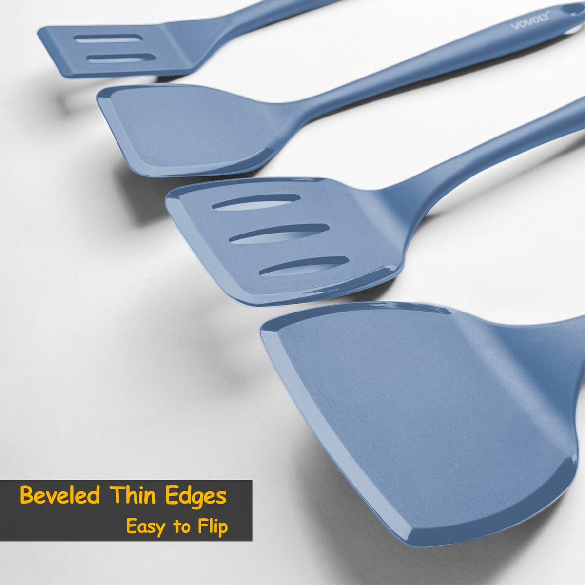 Vovoly slotted spatula drains sauces while lifting foods.