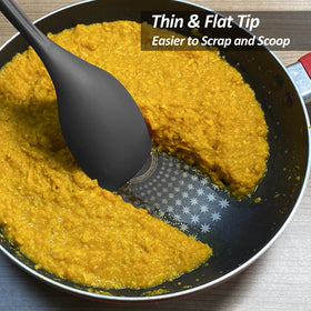 Vovoly silicone spoon for scraping bowls without scratching non-stick surfaces.