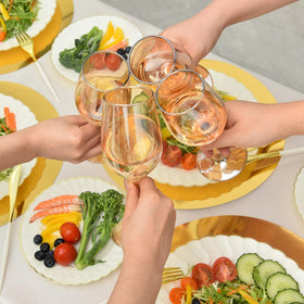 Vumdua gold foil placemats keep surfaces clean during meals.