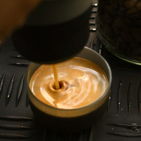 WACACO Minipresso GR2 double wall insulation provides a cool touch grip