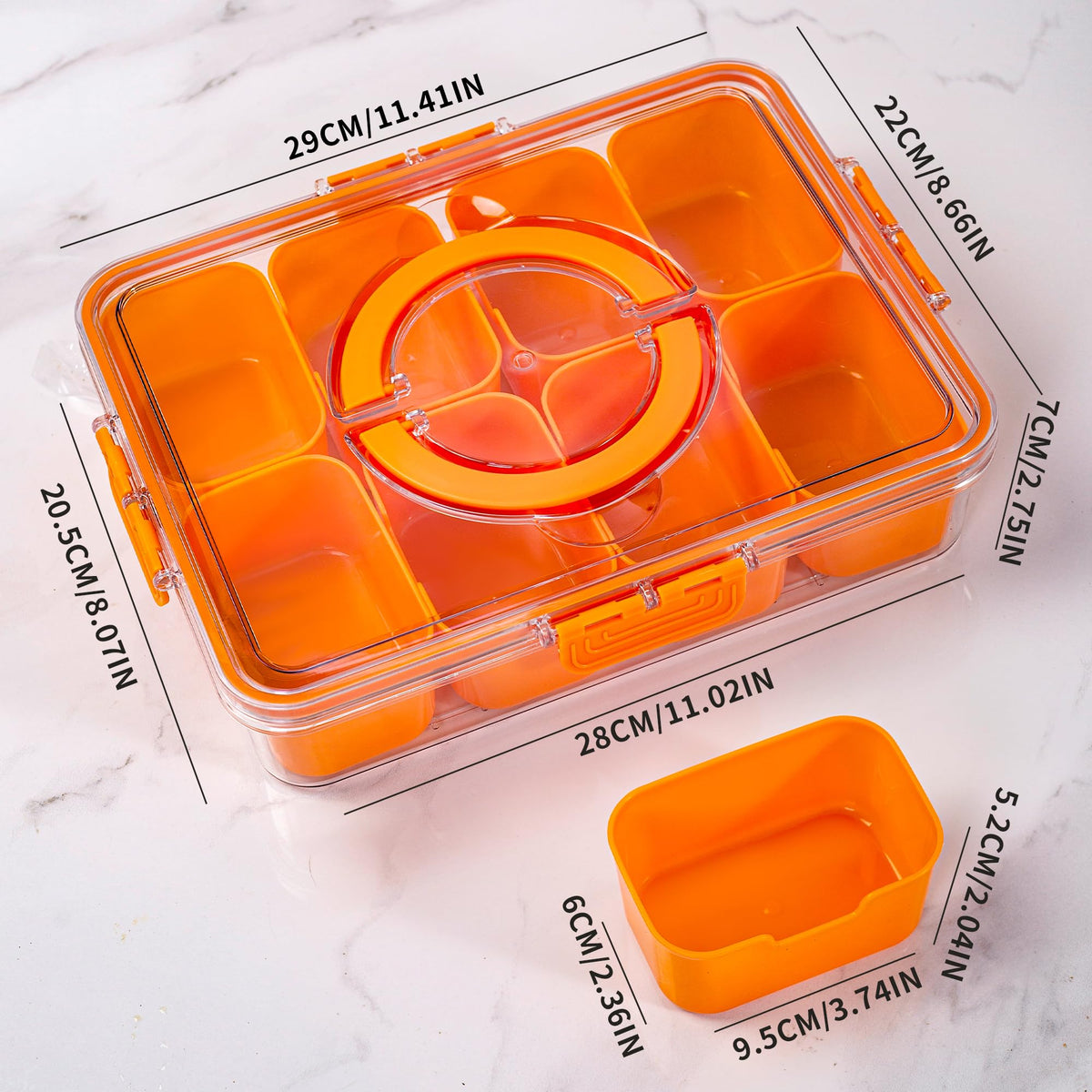 Eight-compartment WACOI tray open, showcasing varied snacks for travel.