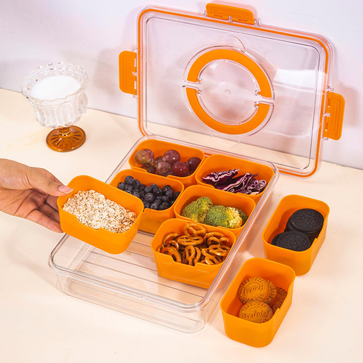 WACOI tray with sealed lid for secure transport of snacks like nuts and fruits.
