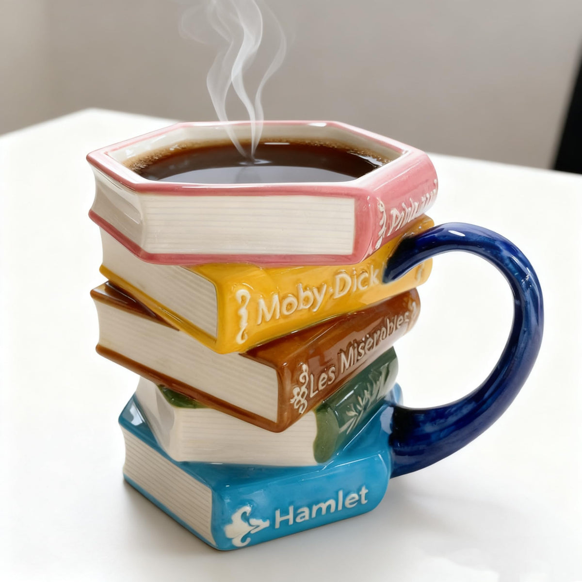 WACOI navy-handled mug with colorful book spines, a compact everyday companion.
