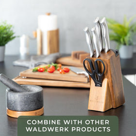 WALDWERK 7-piece kitchen set in use during meal prep.