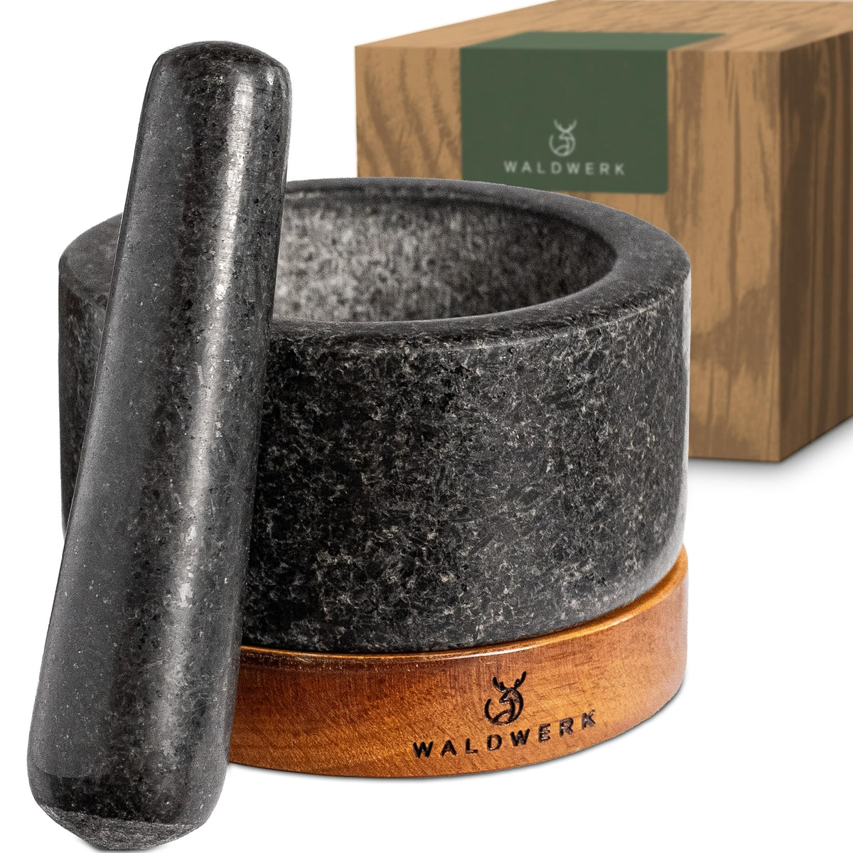 WALDWERK mortar with acacia wood base protects counters during grinding.
