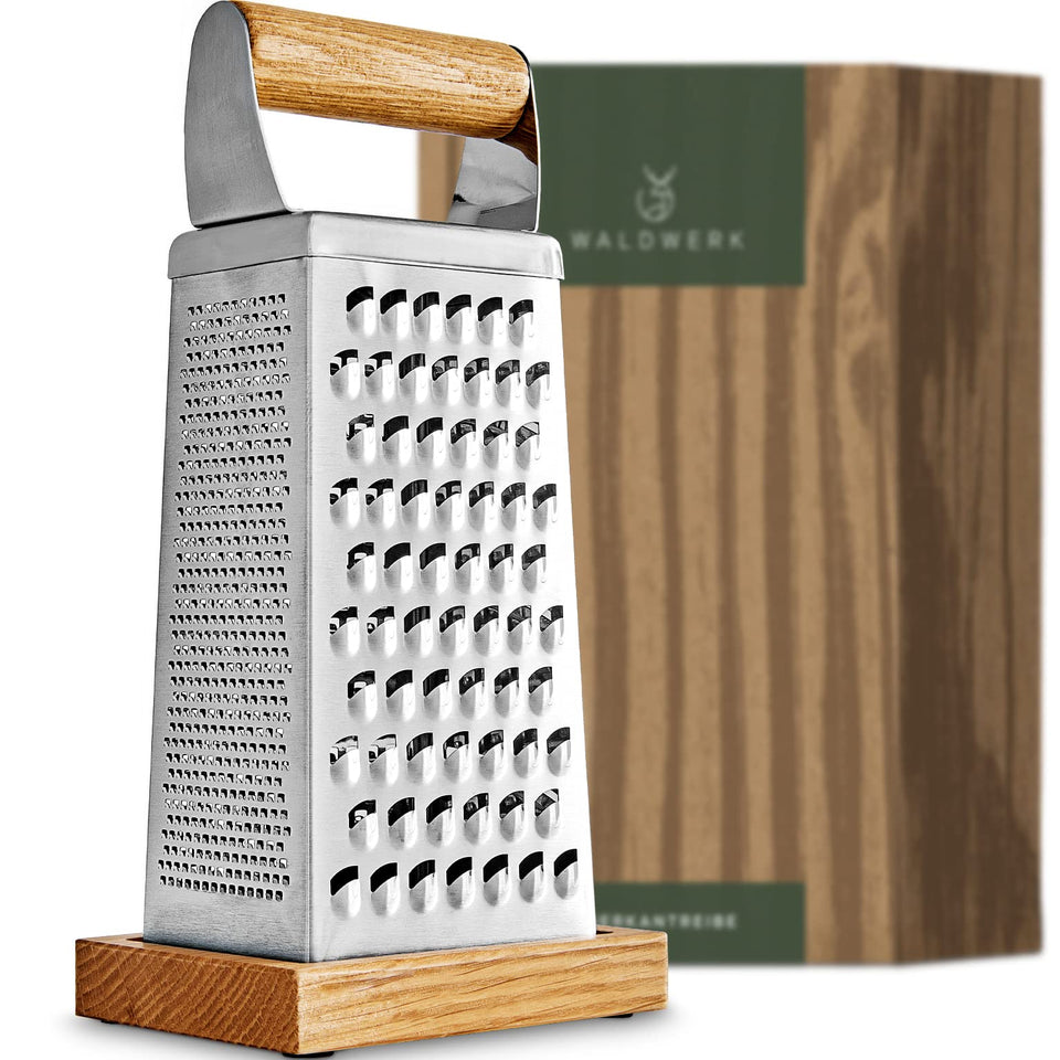 WALDWERK premium grater with etched blades on oak base for stable, precise shredding.