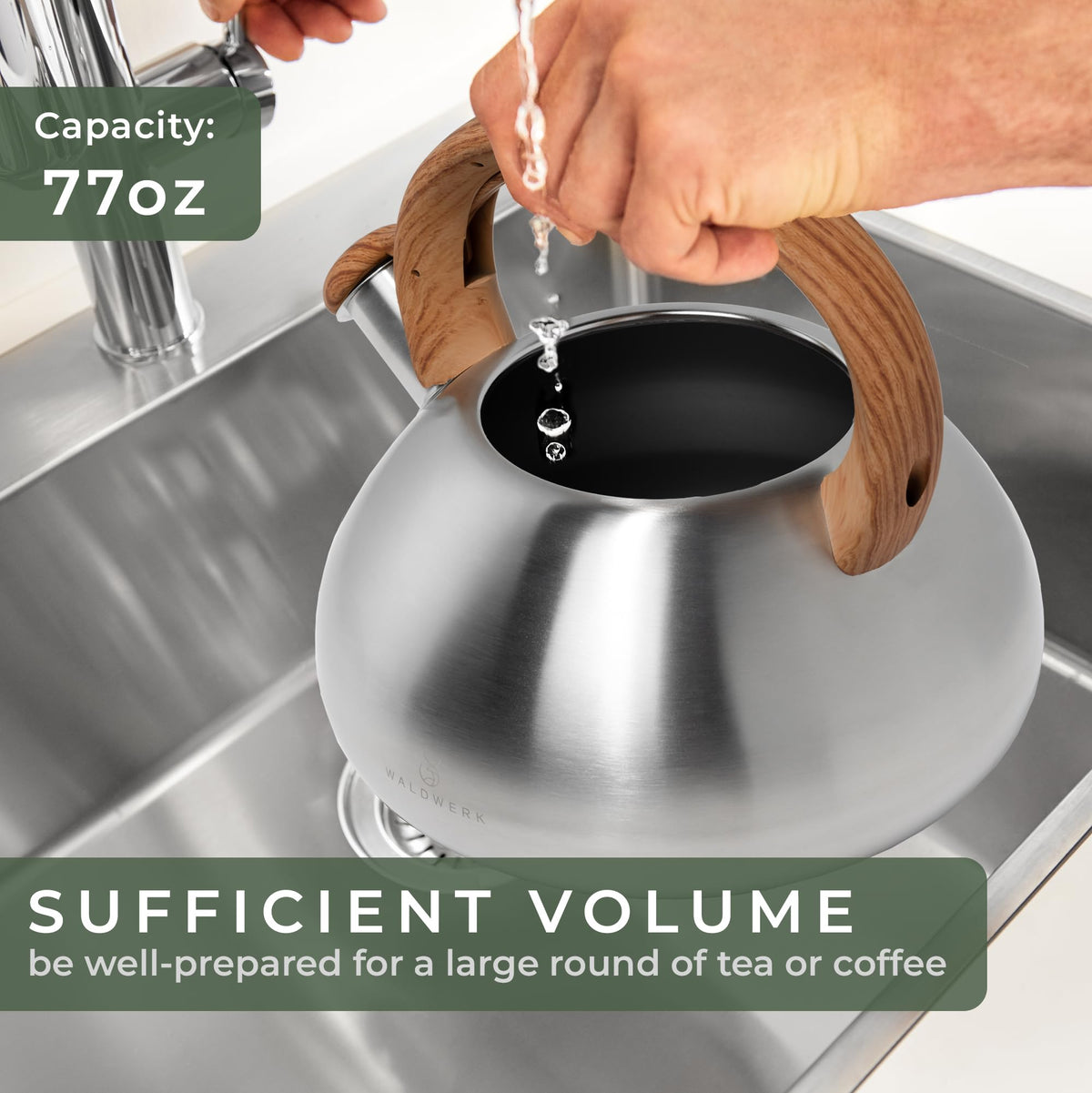 WALDWERK tea kettle on a gas stove with a durable steel body.