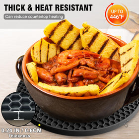 Walfos silicone trivet doubles as a drying mat for utensils.