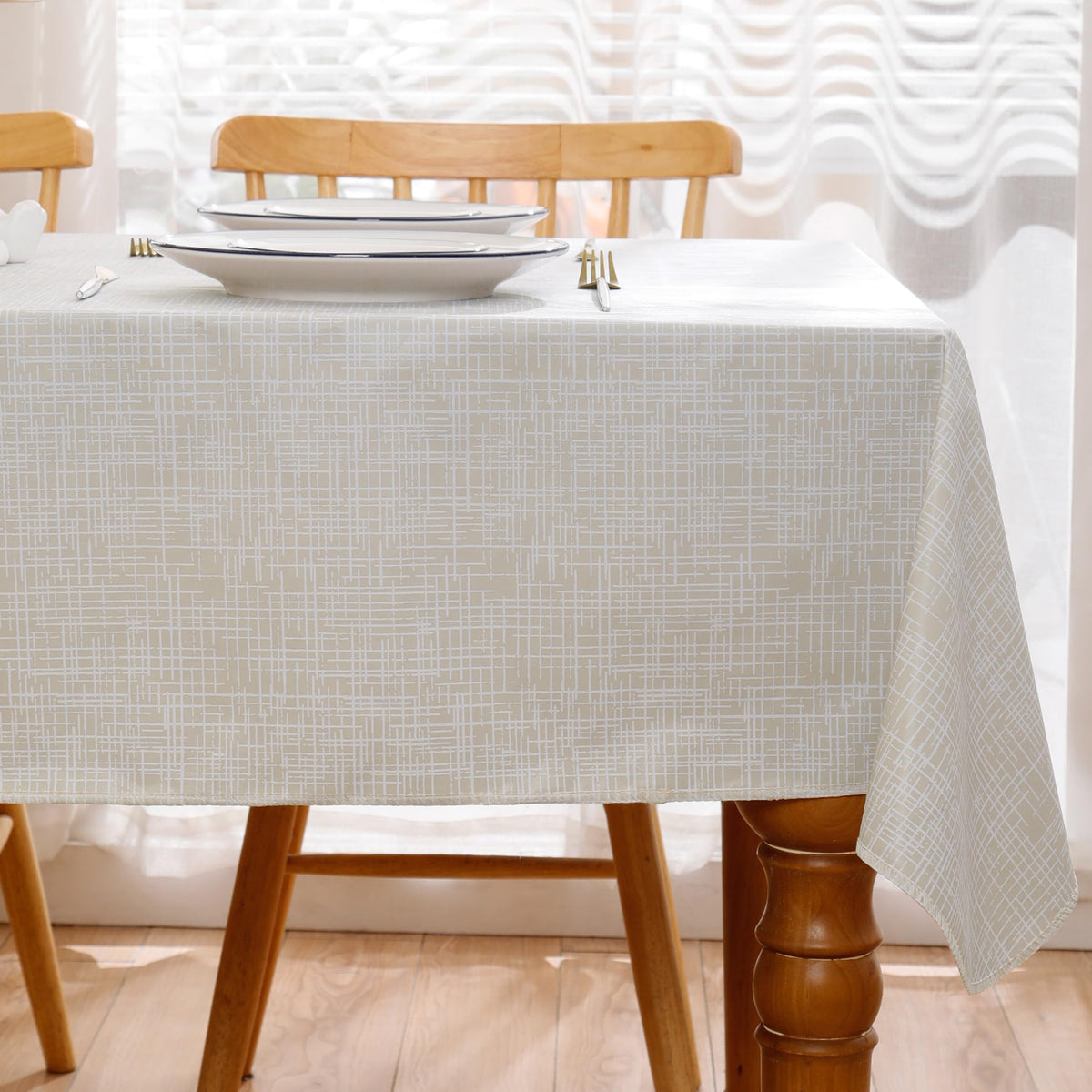 Walrus beige-striped tablecloth showcases waterproof, easy-clean durability for indoor and outdoor dining