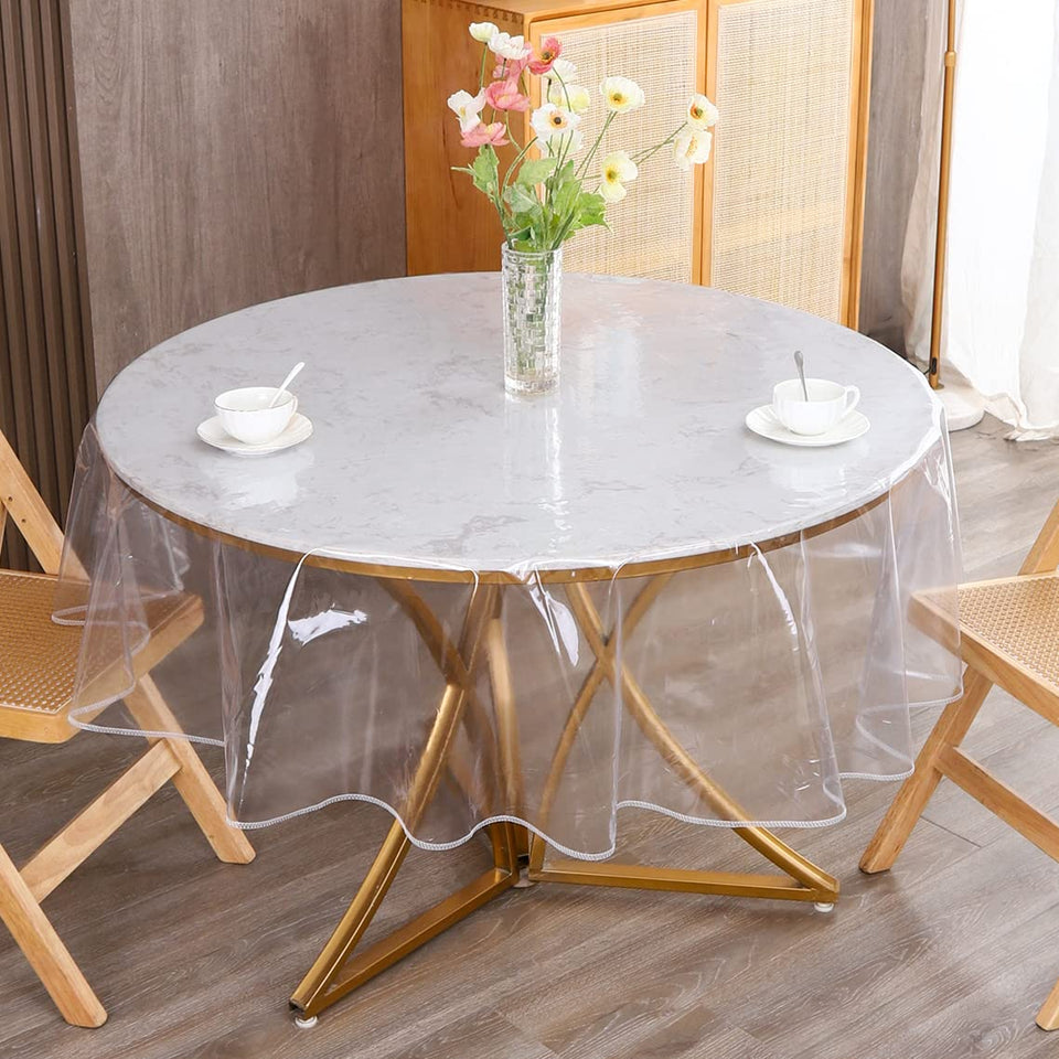 Walrus clear round tablecloth protector preserves wood grain while guarding against spills.