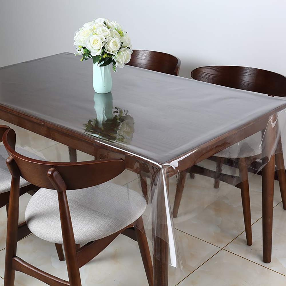 Walrus clear vinyl tablecloth on a dinner setup keeps surfaces pristine.