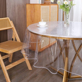 Walrus oil and water resistant cover prevents messes on round tables.