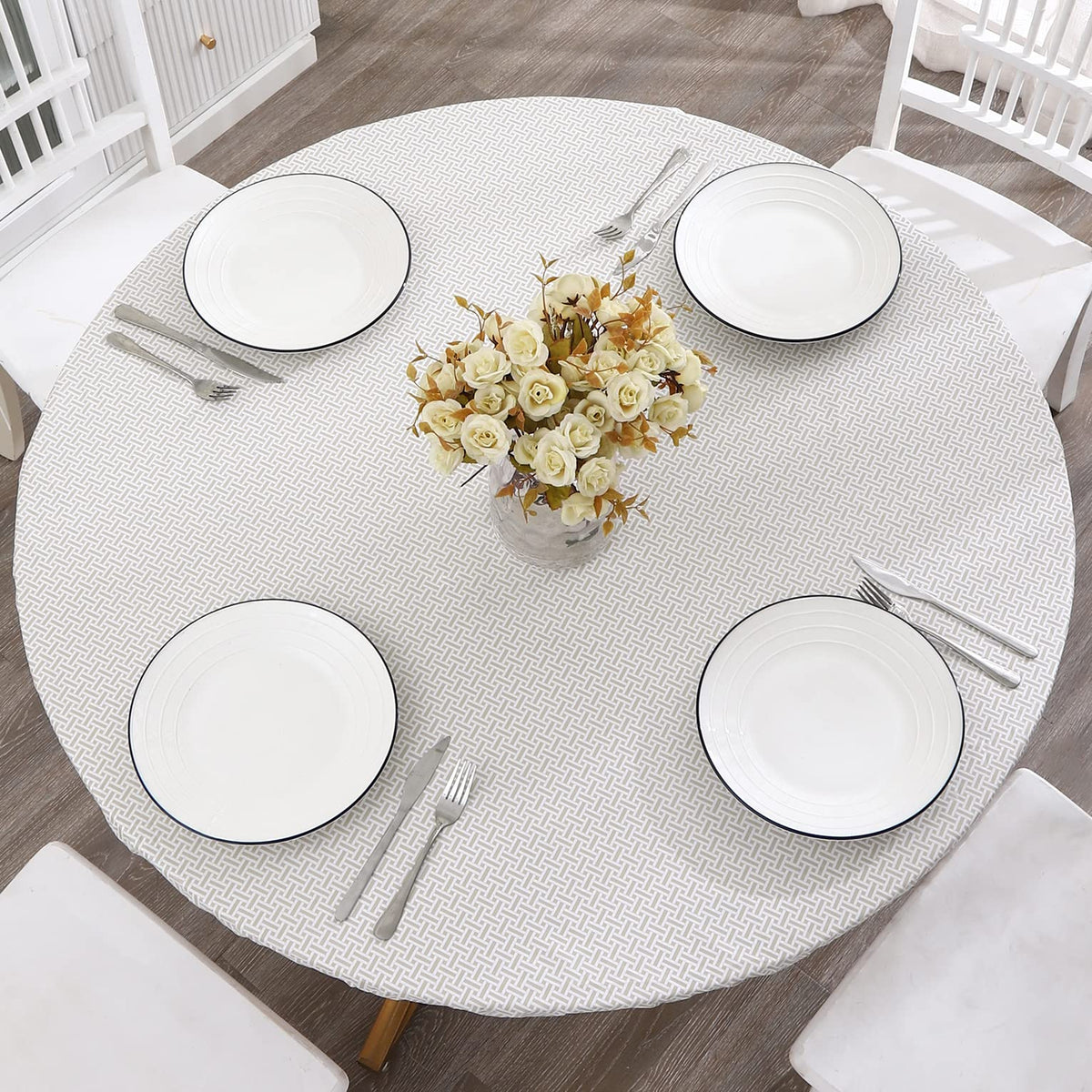 Walrus round vinyl tablecloth with flannel backing protects your table and adds warmth.