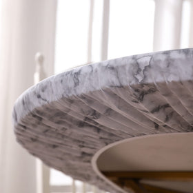 Walrus 57-66 inch round cover enhances any dining setup