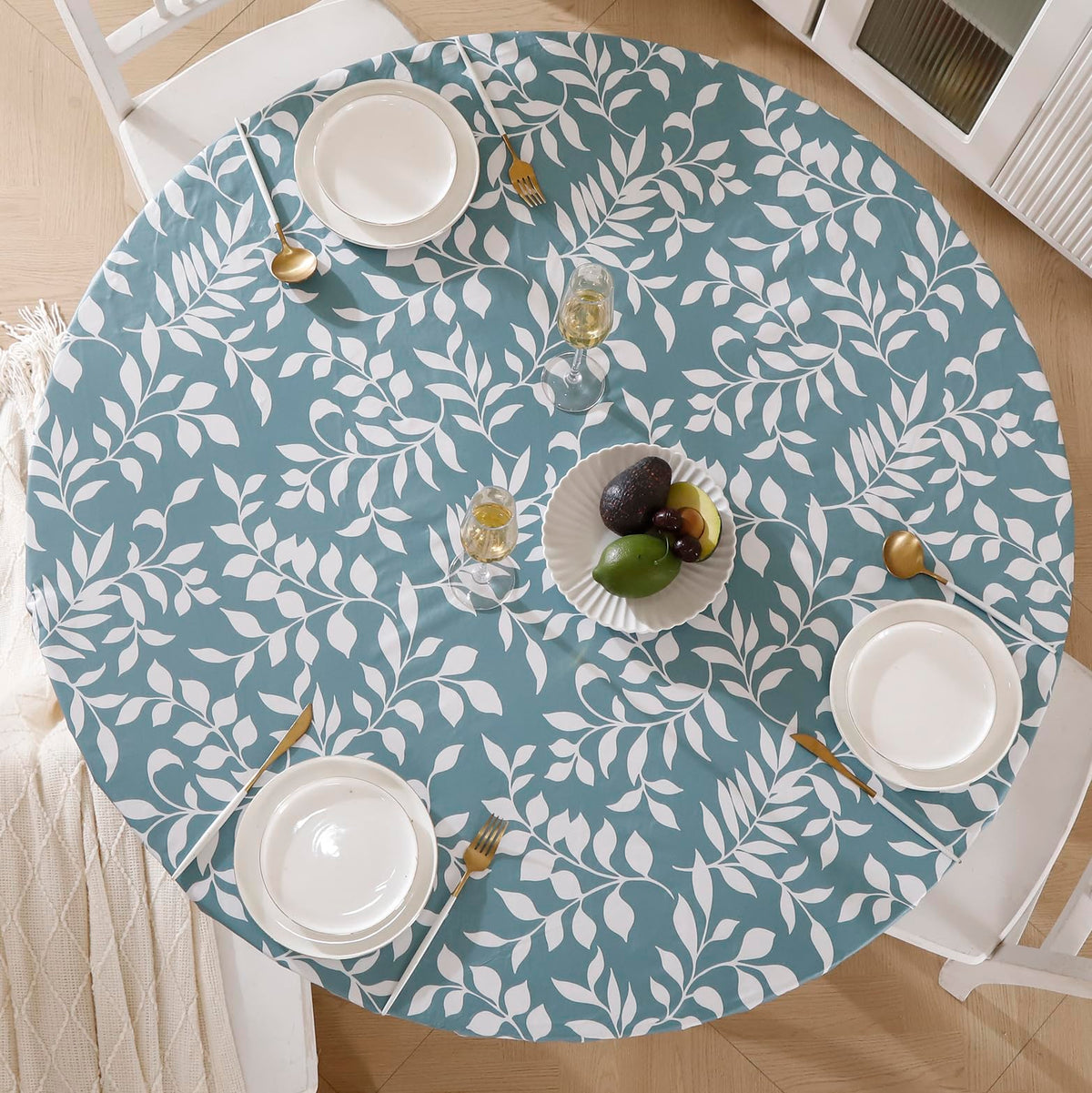 Walrus round vinyl tablecloth with flannel backing offers soft grip and warm look.