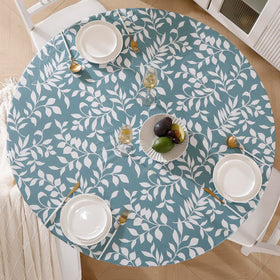Walrus round vinyl tablecloth with flannel backing offers soft grip and warm look.