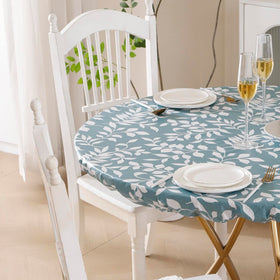 Walrus round vinyl tablecloth fits indoor and outdoor setups.