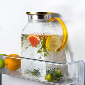 WARMSIMPLE glass pitcher with lid and spout saves fridge space for beverages.
