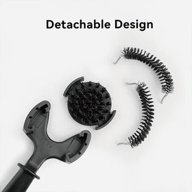 Watchget brush in use on an espresso machine grouphead
