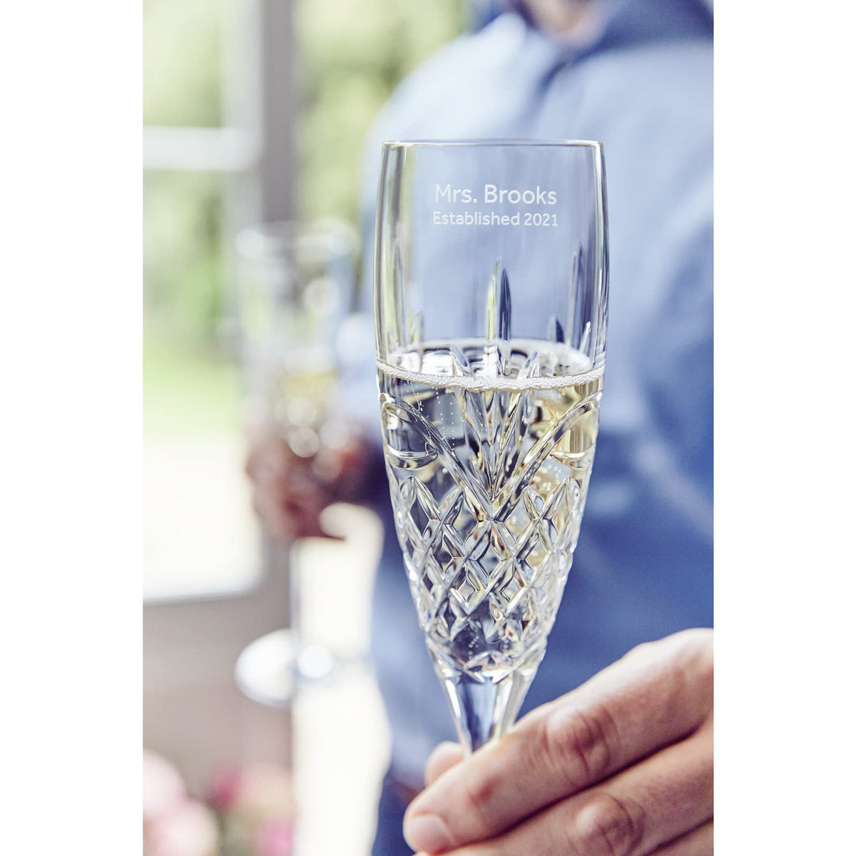 Waterford Eternal Flame motif toasting flute, crystal pattern ideal for renewal vows and milestone celebrations.